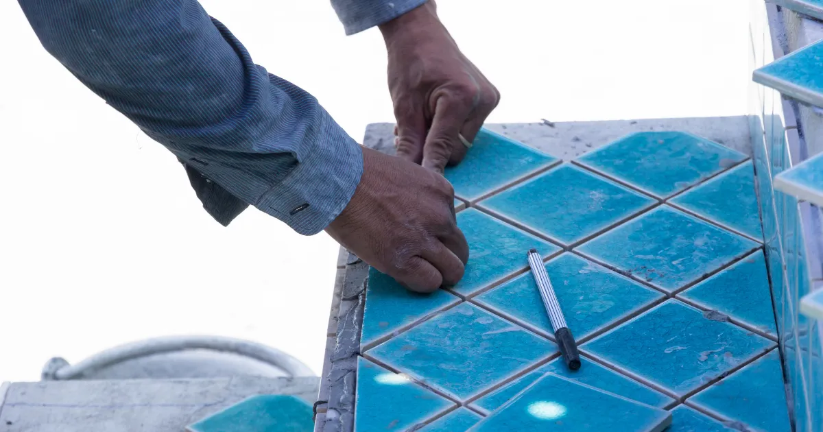 Pool Tiles being laid